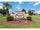 Community sign for Paddocks West, set among lush greenery, creating a welcoming entrance at 6405 Alesheba Ln, Sarasota, FL 34240