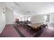 Versatile meeting room with ample seating, offering a flexible space for gatherings and events at 6860 Whitman Ct # 32B, Sarasota, FL 34243