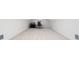 Spacious bonus room with carpeted flooring, natural light, and an office setup at 7003 Lancaster Ct, University Park, FL 34201