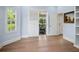 Bright room features a sliding glass door overlooking the backyard pool and patio at 7003 Lancaster Ct, University Park, FL 34201