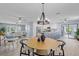 Open dining and kitchen area with modern finishes, new floors, and lots of space at 714 & 716 Apalachicola Rd, Venice, FL 34285