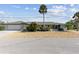 Charming single-story home with well-kept landscaping, and a convenient two car garage at 714 & 716 Apalachicola Rd, Venice, FL 34285