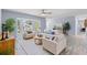 Comfortable living room featuring lots of natural light, neutral tones, and stylish floors at 714 & 716 Apalachicola Rd, Venice, FL 34285