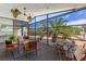 The screened in patio has seating for 6 with great views at 714 & 716 Apalachicola Rd, Venice, FL 34285