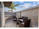 Private patio with outdoor seating, ideal for relaxation and enjoying the tropical climate at 714 & 716 Apalachicola Rd, Venice, FL 34285