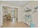 Open dining space featuring a coffee bar with dolphin decor and furniture accents at 8007 17Th Nw Ave, Bradenton, FL 34209