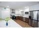 Bright kitchen featuring stainless steel appliances and white subway tile backsplash at 8007 17Th Nw Ave, Bradenton, FL 34209
