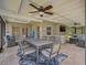 Screened patio featuring a dining table and chairs, lounge area, and stylish decor at 8007 17Th Nw Ave, Bradenton, FL 34209