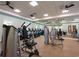 Bright fitness center with modern equipment and mirrored walls for a complete workout experience at 8078 Stirling Falls Cir, Sarasota, FL 34243