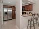 Eat-in kitchen featuring stainless steel appliances and counter-height seating making this space ideal for entertaining at 8472 60Th N St # 702, Pinellas Park, FL 33781