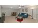 Inviting living room with comfortable seating, stylish decor, and plenty of natural light illuminating the area at 8472 60Th N St # 702, Pinellas Park, FL 33781