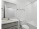 A bathroom with a shower and sink at 8815 Windlass Cv, Parrish, FL 34219