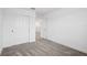 A clean, carpeted bedroom with closet space at 8815 Windlass Cv, Parrish, FL 34219
