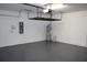 Garage with storage rack at 8815 Windlass Cv, Parrish, FL 34219