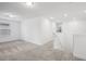 Upstairs living area with neutral carpet and white walls at 8815 Windlass Cv, Parrish, FL 34219