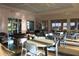 Relaxing lounge area with ample seating and tables for community members to enjoy at 8815 Windlass Cv, Parrish, FL 34219