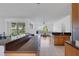 Spacious kitchen with a breakfast bar, opening to a living area and outdoor view at 9402 71St E Ave, Palmetto, FL 34221