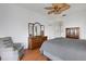 Spacious main bedroom with ample closet space and a ceiling fan at 9402 71St E Ave, Palmetto, FL 34221