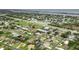 Aerial view showing proximity to the open bay in a residential neighborhood at 107 Van Dyck Dr, Nokomis, FL 34275
