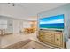 An open-concept space with tile floors and a large TV on a dresser at 107 Van Dyck Dr, Nokomis, FL 34275