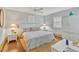 Serene main bedroom boasts a calming color palette, plush bedding, and tasteful decor, offering a peaceful retreat at 107 Van Dyck Dr, Nokomis, FL 34275