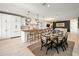 The kitchen and dining area offers a bright space, perfect for entertaining at 109 Palmetto Ave, Anna Maria, FL 34216
