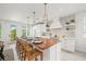 Bright kitchen with a large center island and stainless-steel appliances at 109 Palmetto Ave, Anna Maria, FL 34216