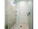 Elegant shower with glass enclosure, stylish tile, and modern fixtures at 109 Palmetto Ave, Anna Maria, FL 34216