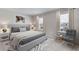This bedroom features a neutral color palette, large windows and carpeted floor at 12047 Kingsley Trl, Parrish, FL 34219