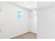 Compact walk-in closet with wire shelving, offering simple storage solutions at 12064 Lansing Gln, Parrish, FL 34219