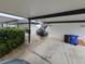 Assigned carport parking with nearby stair access to units and additional storage at 1211 Capri Isles Blvd # 116, Venice, FL 34292