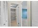 Hallway bathroom featuring a stand-up shower with tiled walls at 1227 56Th St W # 1227, Bradenton, FL 34209
