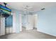 Bedroom with mirrored closets and a ceiling fan at 1227 56Th St W # 1227, Bradenton, FL 34209