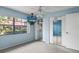 Cozy bedroom showcasing mirrored closet doors and a mounted television at 1227 56Th St W # 1227, Bradenton, FL 34209