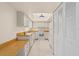 Efficient kitchen featuring white appliances, wood countertops, and ample cabinet space at 1227 56Th St W # 1227, Bradenton, FL 34209