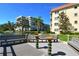 Community dock offering stunning water views, perfect for enjoying the waterfront lifestyle at 1250 N Portofino Dr # 208, Sarasota, FL 34242