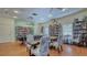 Game room featuring a pool table, library bookshelves, and a versatile space for activities and relaxation at 1250 N Portofino Dr # 208, Sarasota, FL 34242