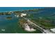 Panoramic aerial view of waterfront property, showcasing bridges and natural beauty at 137 Woodland Pl, Osprey, FL 34229