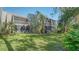 Lush backyard with grass at 137 Woodland Pl, Osprey, FL 34229