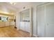Convenient laundry area with washer and dryer, offering plenty of storage within the open kitchen and pantry space at 137 Woodland Pl, Osprey, FL 34229