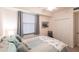 Cozy bedroom features natural light, a ceiling fan, and a full-size closet at 16804 Vardon Ter # 307, Bradenton, FL 34211