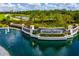 Entrance to Lakewood National featuring manicured landscaping and a water feature at 16804 Vardon Ter # 307, Bradenton, FL 34211
