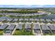 Aerial view of homes in Wellen Park, featuring lush landscaping and serene waterfront views at 17632 Santorini Ct, Venice, FL 34293