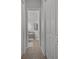 Bright bathroom features a walk-in closet and a relaxing tub at 17632 Santorini Ct, Venice, FL 34293