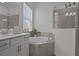 This luxurious bathroom features a tub and a large shower at 17632 Santorini Ct, Venice, FL 34293