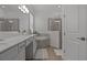 This stylish bathroom features a tub and walk-in shower at 17632 Santorini Ct, Venice, FL 34293