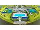 Aerial view of community pool, tennis courts, and amenities surrounded by lush landscaping at 17898 Cherished Loop, Bradenton, FL 34211