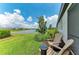 Backyard with a lake view and seating area at 17898 Cherished Loop, Bradenton, FL 34211