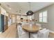 Bright dining area flows into a stylish kitchen with stainless appliances and ample counter space at 17898 Cherished Loop, Bradenton, FL 34211