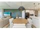 Open concept layout combining dining area with a modern kitchen, perfect for gatherings and everyday living at 17898 Cherished Loop, Bradenton, FL 34211